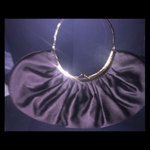BCBG MAXAZRIA curve shaped hand bag - like new